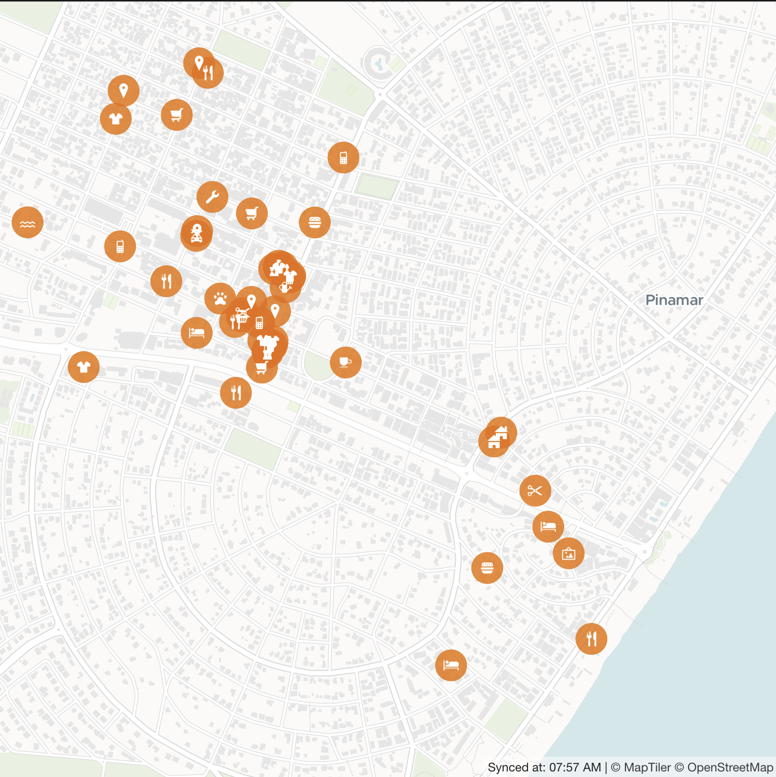 A BTC Map view of Pinamar, Argentina, each orange pin a business tagged as accepting bitcoin